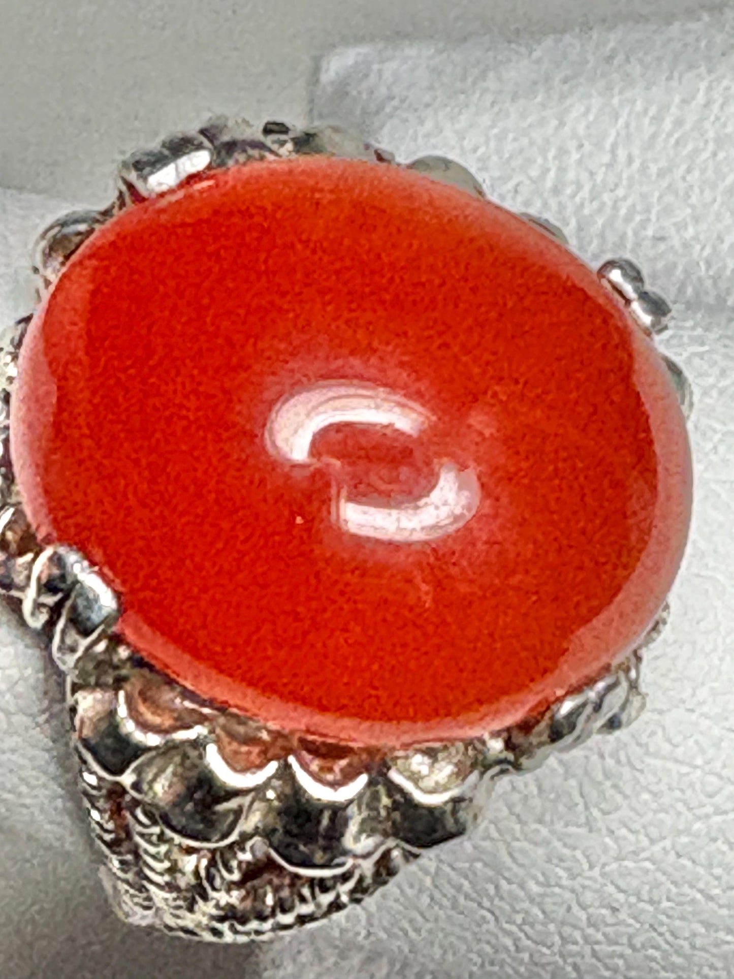 Sterling silver ring with a bold, oval carnelian cabochon.