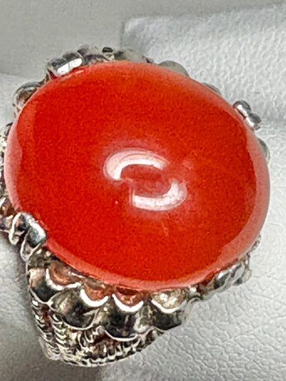 Sterling silver ring with a bold, oval carnelian cabochon.