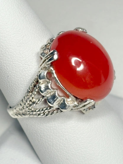 Sterling silver ring with a large oval carnelian cabochon.