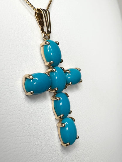 14k gold cross pendant necklace with six oval Sleeping Beauty turquoise stones.