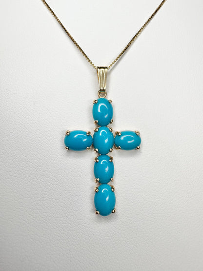 14k gold cross pendant necklace with six oval Sleeping Beauty turquoise stones.