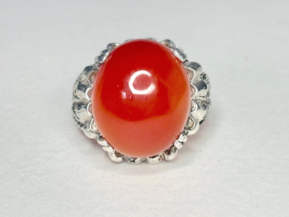 Sterling silver ring with a large oval carnelian cabochon.