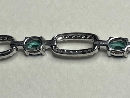 Oval alexandrite and diamond bracelet in white gold.