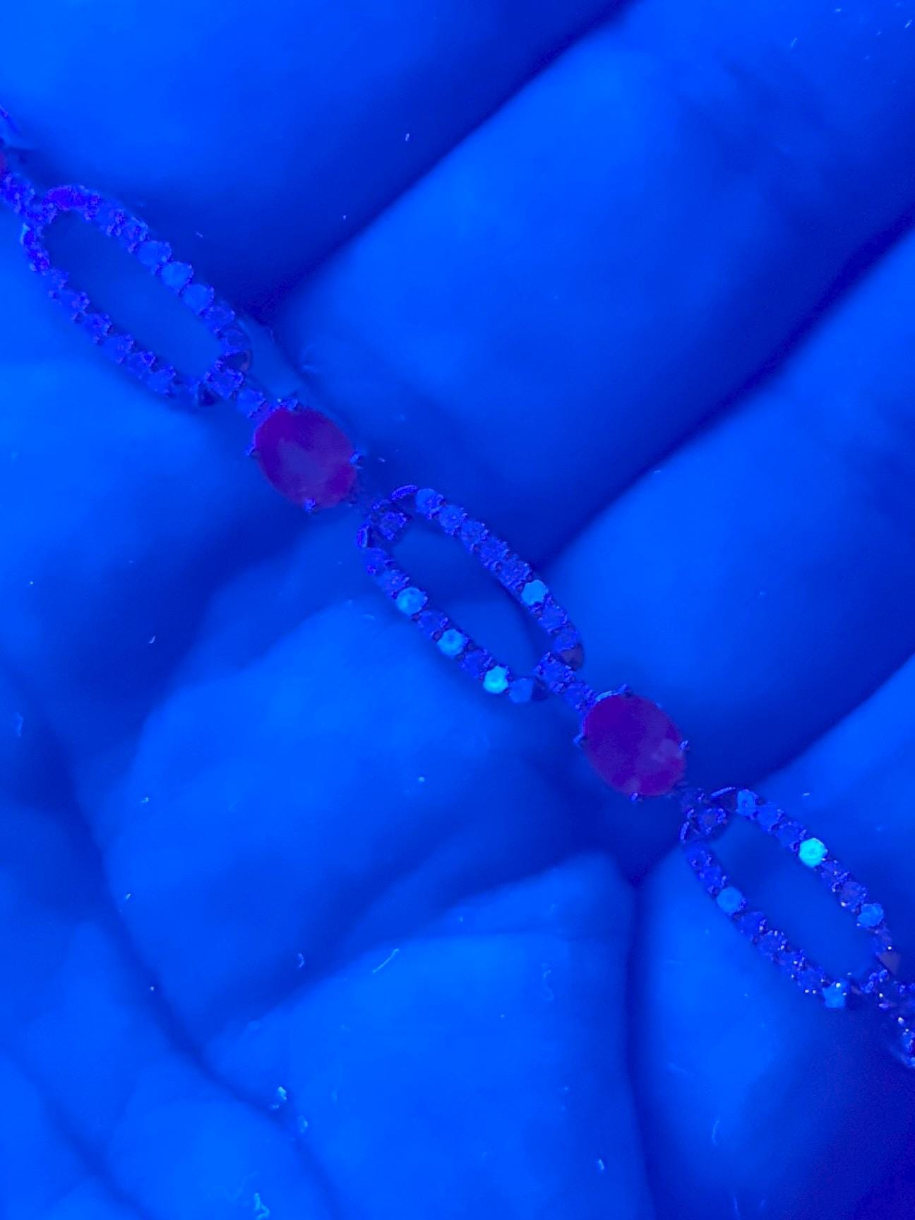 Oval alexandrite and diamond bracelet in 14k white gold.