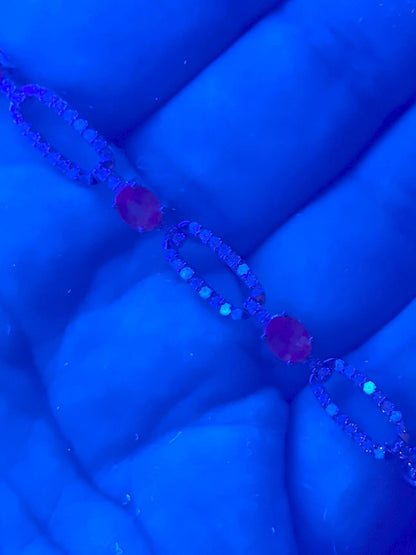 Oval alexandrite and diamond bracelet in 14k white gold.