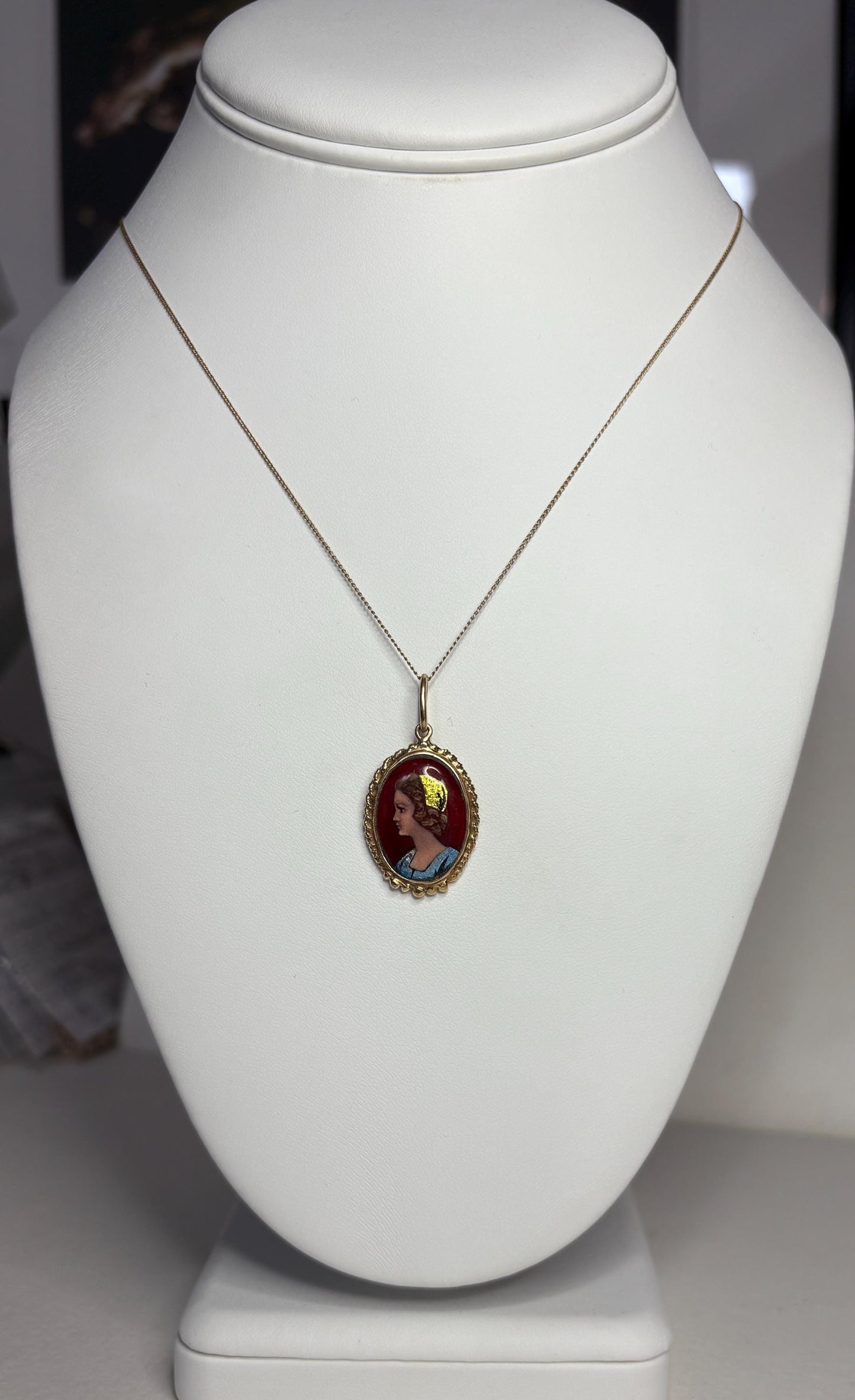 Antique French solid gold pendant necklace with guilloche enamel portrait.