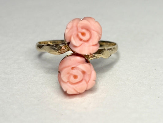 10k gold ring with two carved angel skin coral rose buds.