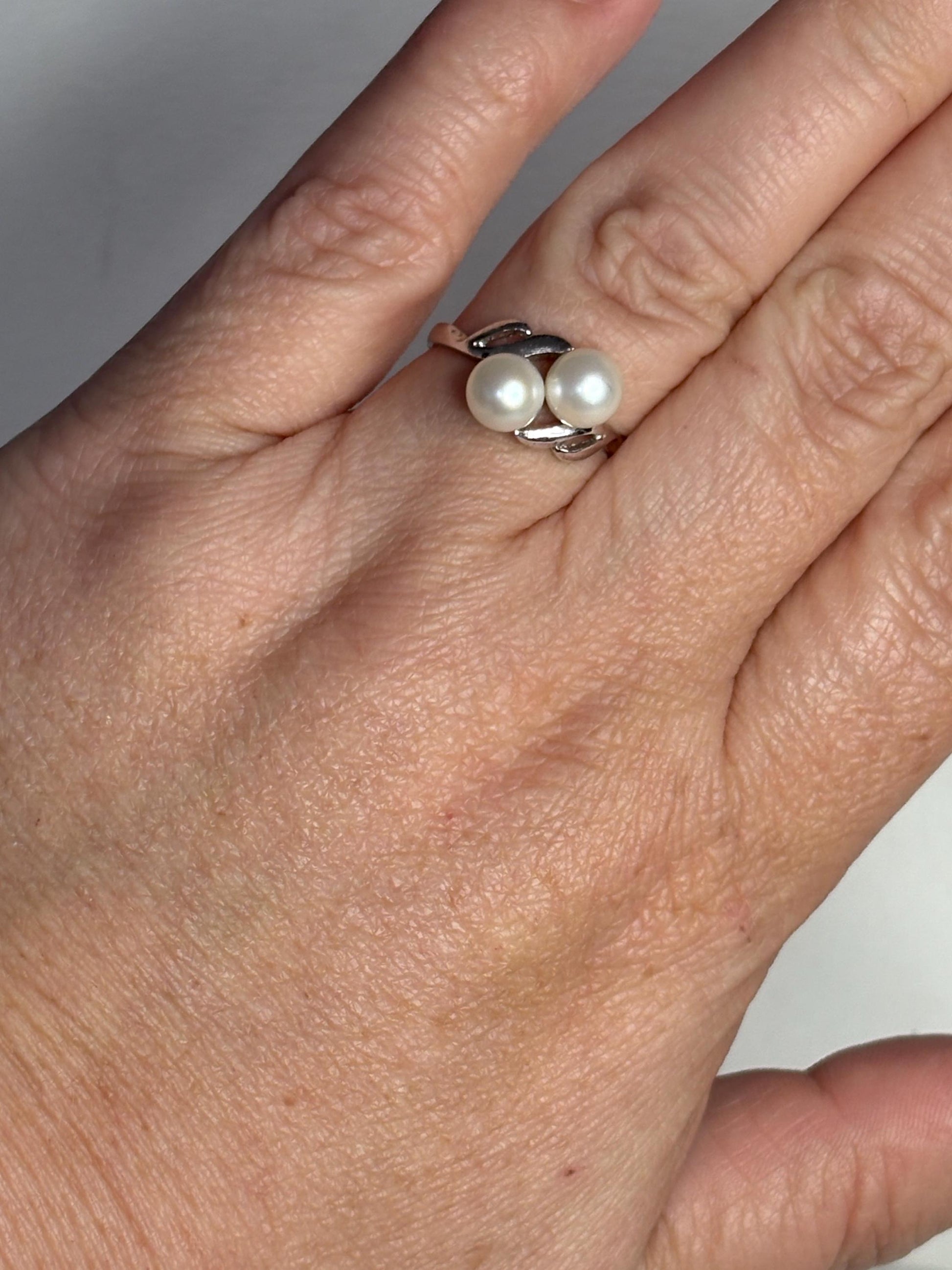 Vintage rhodium plated sterling silver ring with two Akoya pearls.