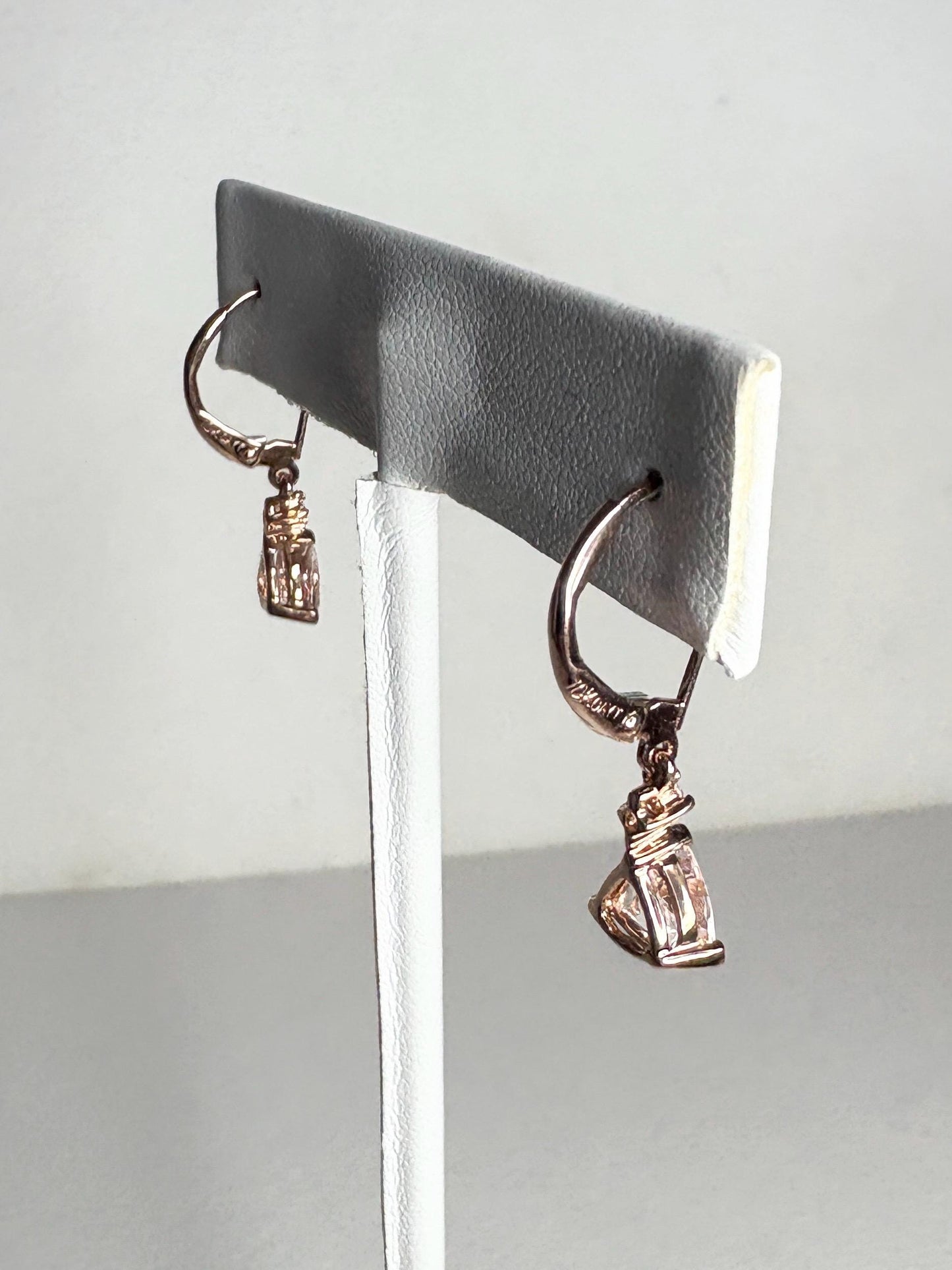 10k rose gold dangle earrings with trillion morganite and diamond accents.