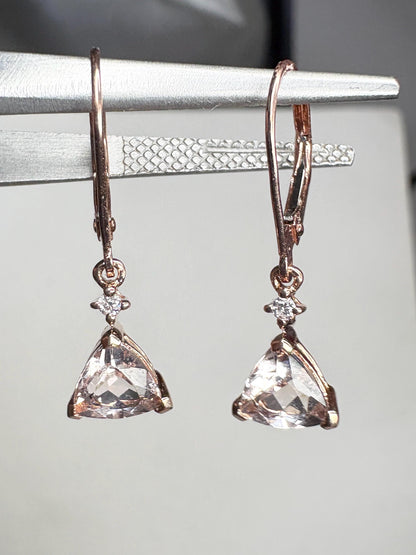 Rose gold dangle earrings with trillion morganite and diamond accents.