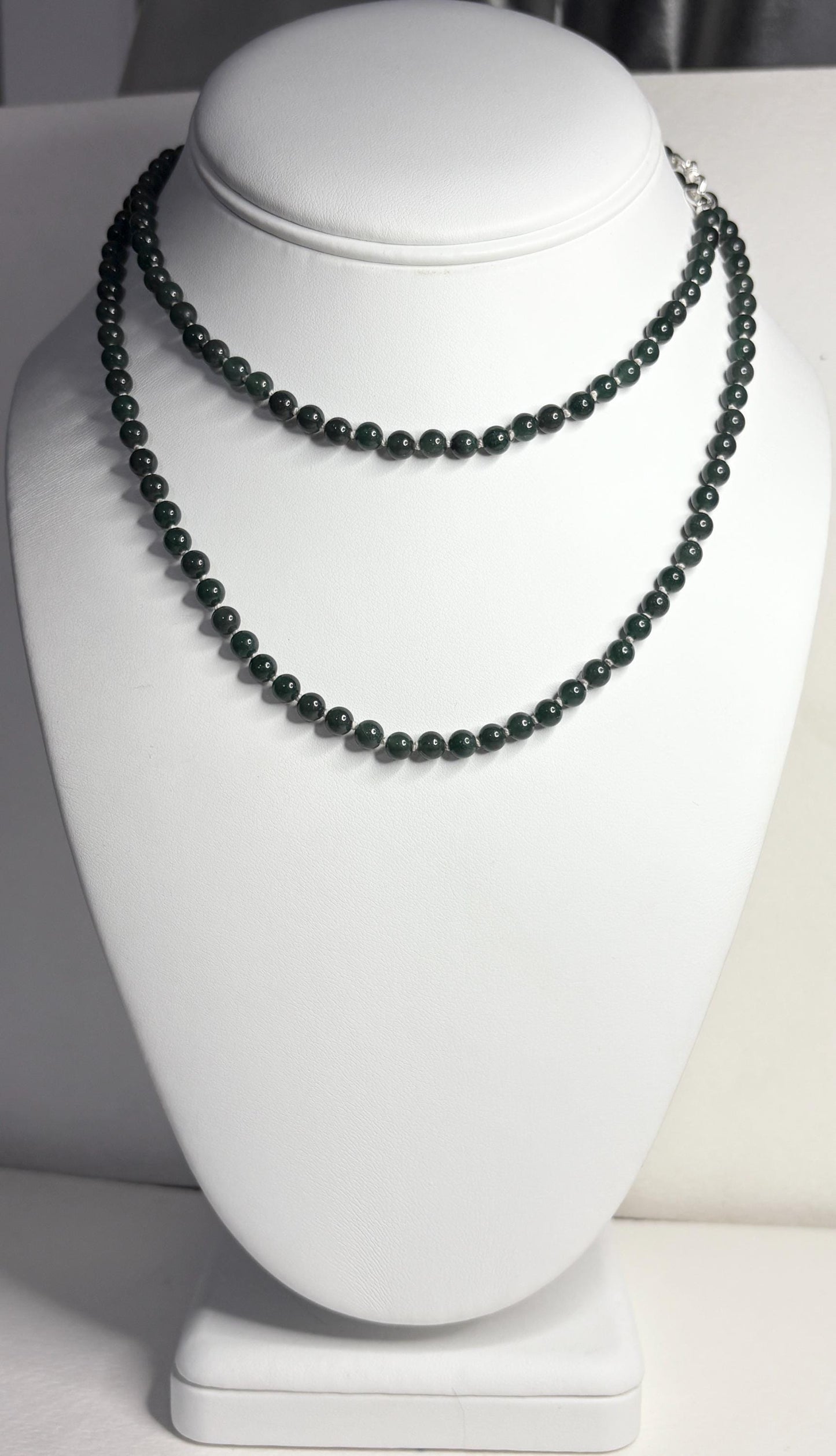 Teal jadeite jade beaded necklace with sterling silver clasp.