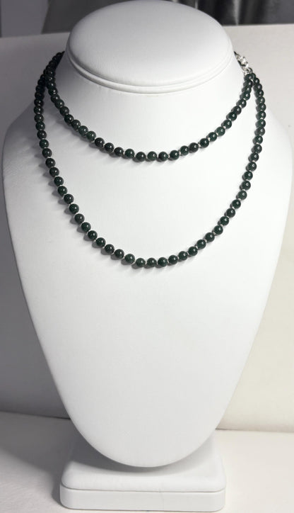 Teal jadeite jade beaded necklace with sterling silver clasp.