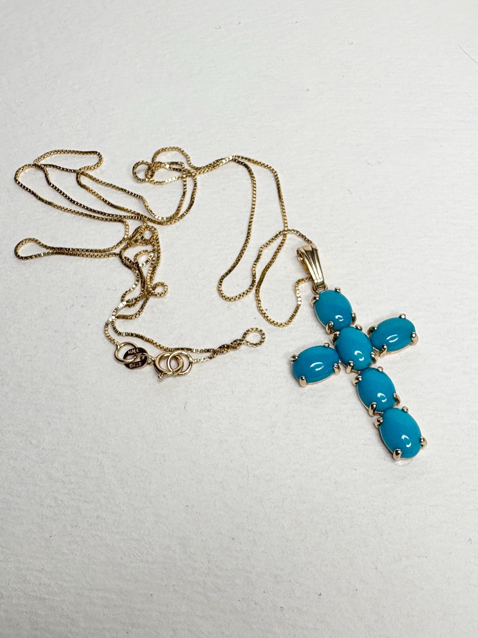 14k gold cross pendant necklace with six Sleeping Beauty turquoise stones on a 22" box chain.