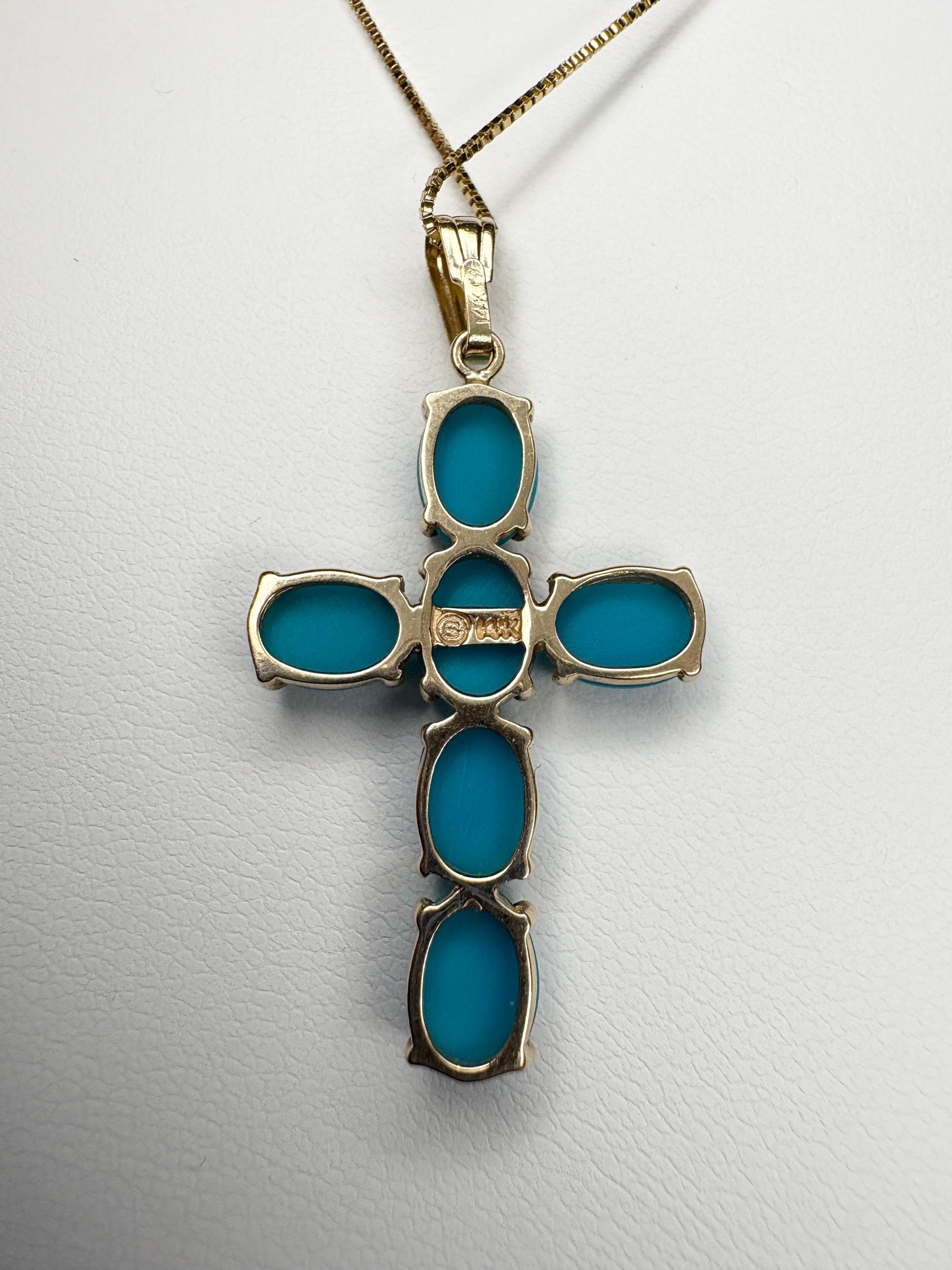 14k gold cross pendant necklace with Sleeping Beauty turquoise stones.