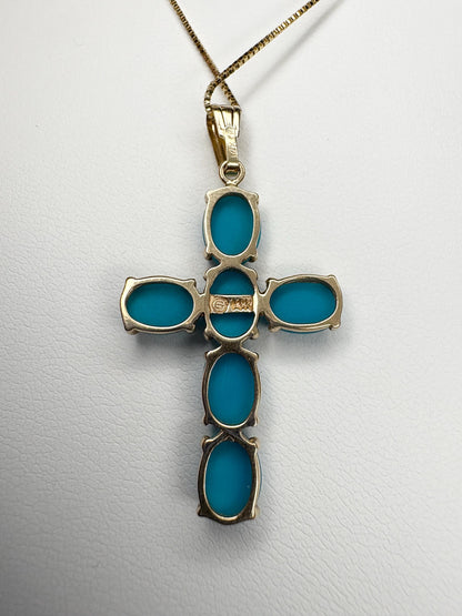 14k gold cross pendant necklace with Sleeping Beauty turquoise stones.