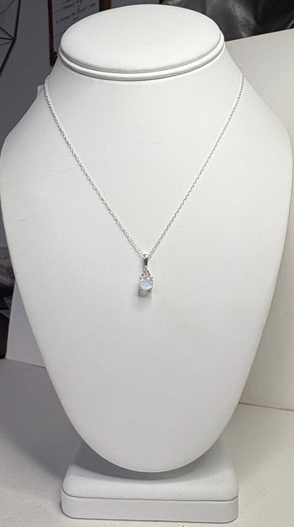 Sterling silver necklace with rainbow moonstone and zircon pendant.