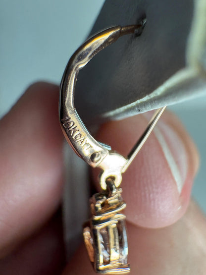 10k rose gold dangle earrings with a trillion morganite and diamond accent.