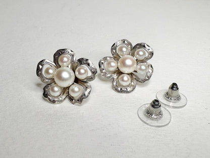 Vintage sterling silver flower earrings with Akoya cultured pearls.