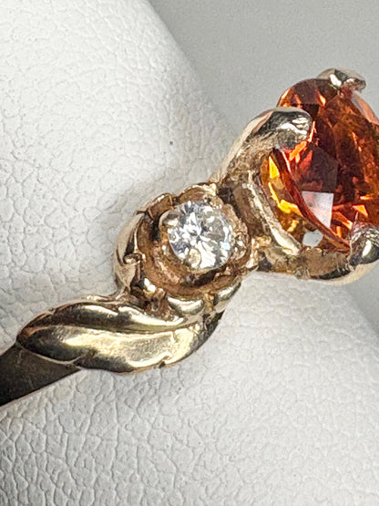 14k gold ring with Madeira citrine, diamonds, and floral design.