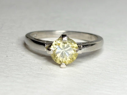 Sterling silver ring with a yellow moissanite solitaire, size 7.