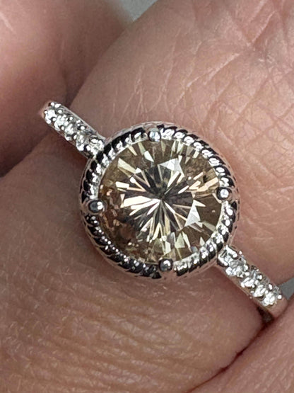 Oregon Sunstone and white topaz solitaire ring in sterling silver.