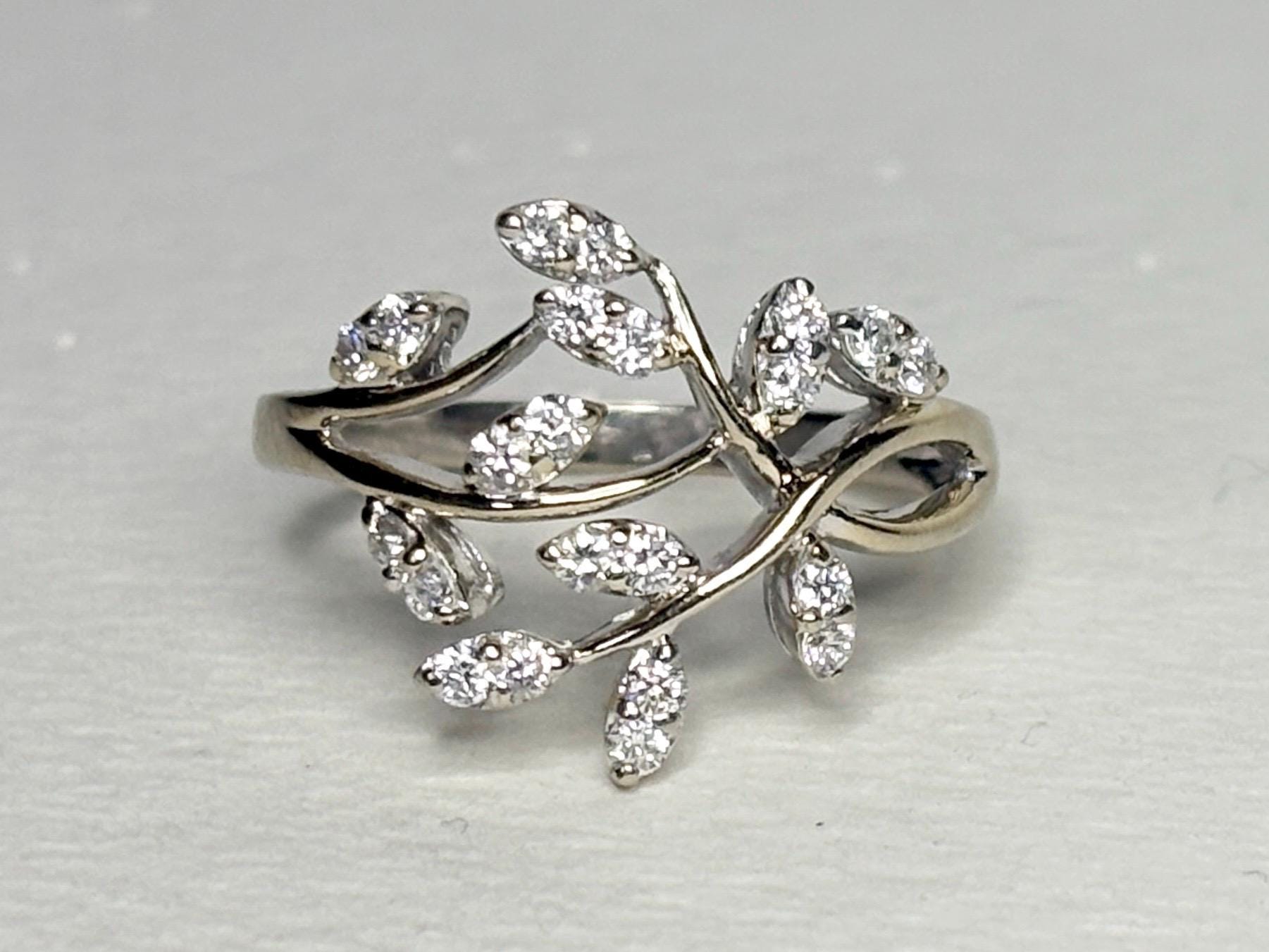 A 14k white gold vine-style ring with 1/2 carat of diamonds.