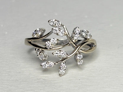 A 14k white gold vine-style ring with 1/2 carat of diamonds.