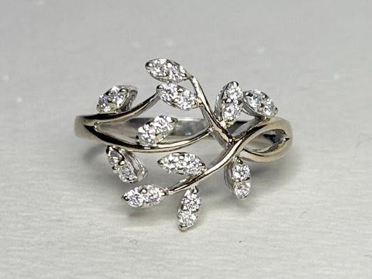 A 14k white gold vine-style ring with 1/2 carat of diamonds.