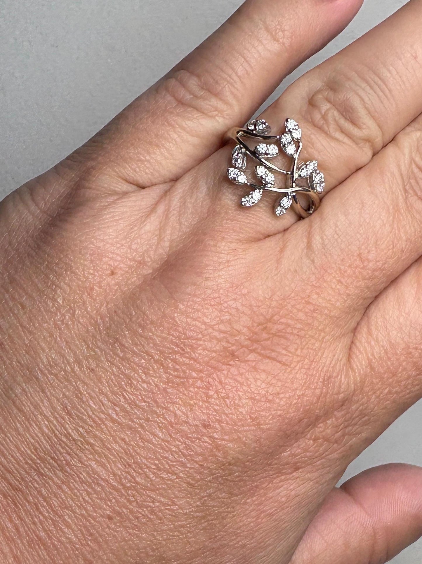 Diamond vine style ring in 14k white gold.