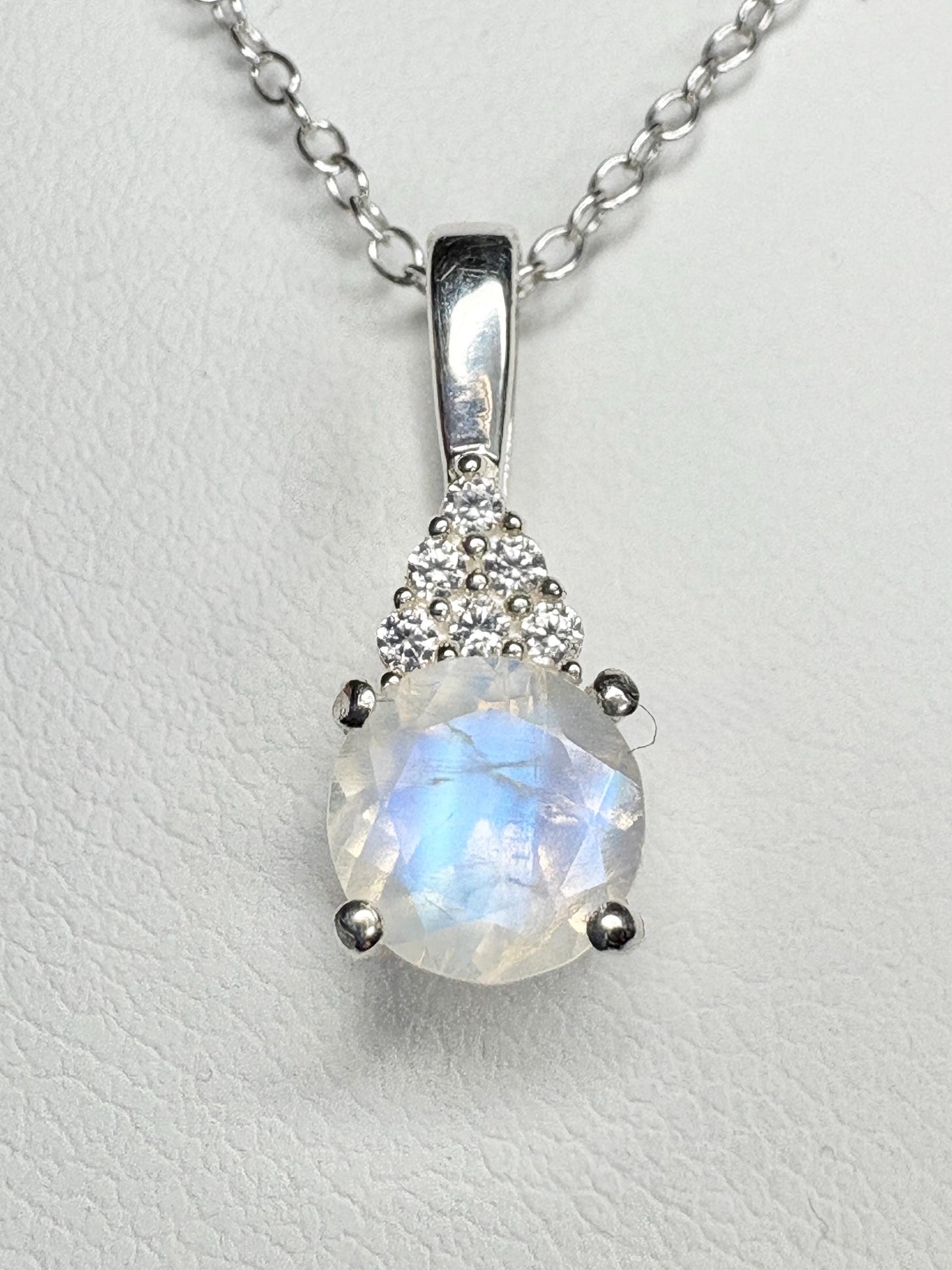 Sterling silver pendant necklace with rainbow moonstone and zircon.