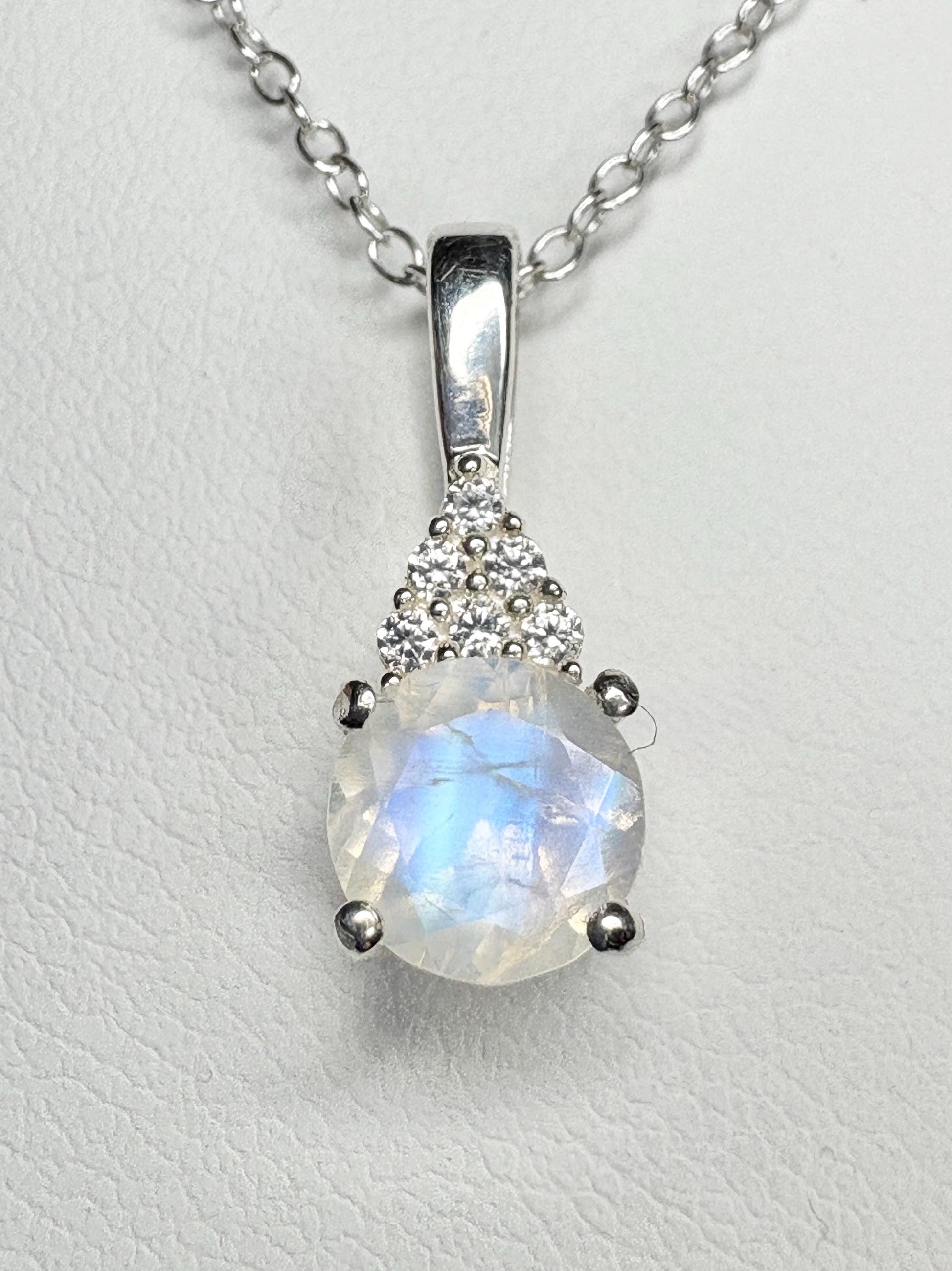 Sterling silver pendant necklace with rainbow moonstone and zircon.