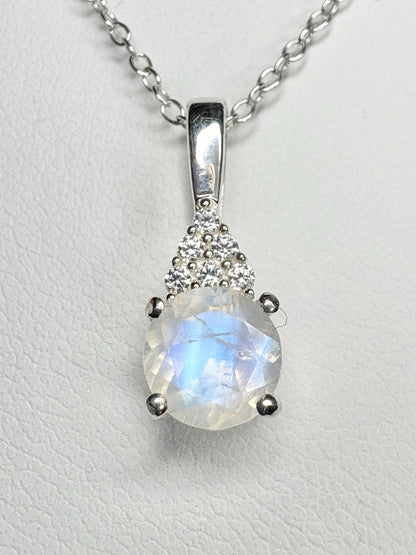 Sterling silver pendant necklace with rainbow moonstone and zircon.