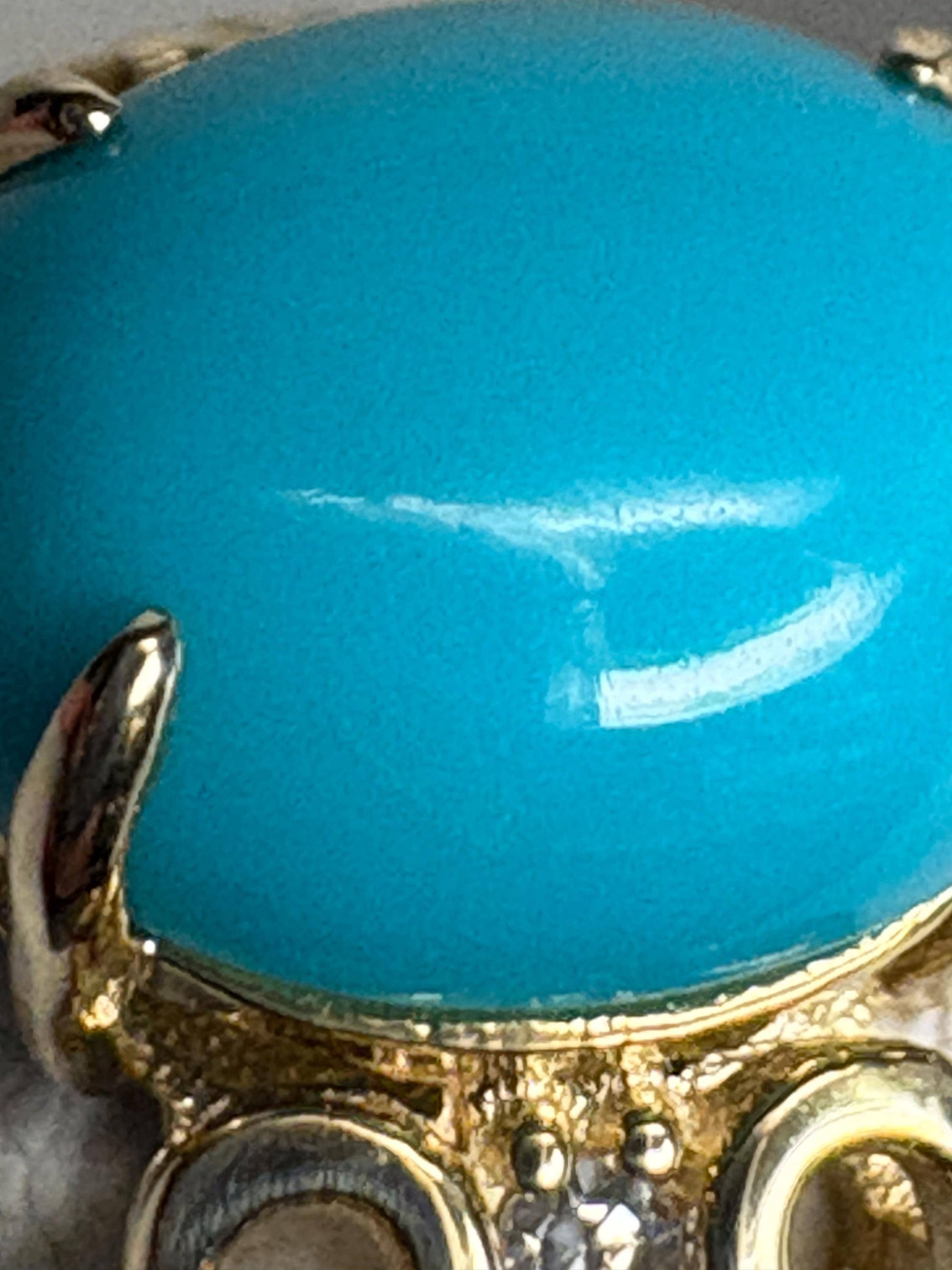 Turquoise and diamond ring in 10k gold.