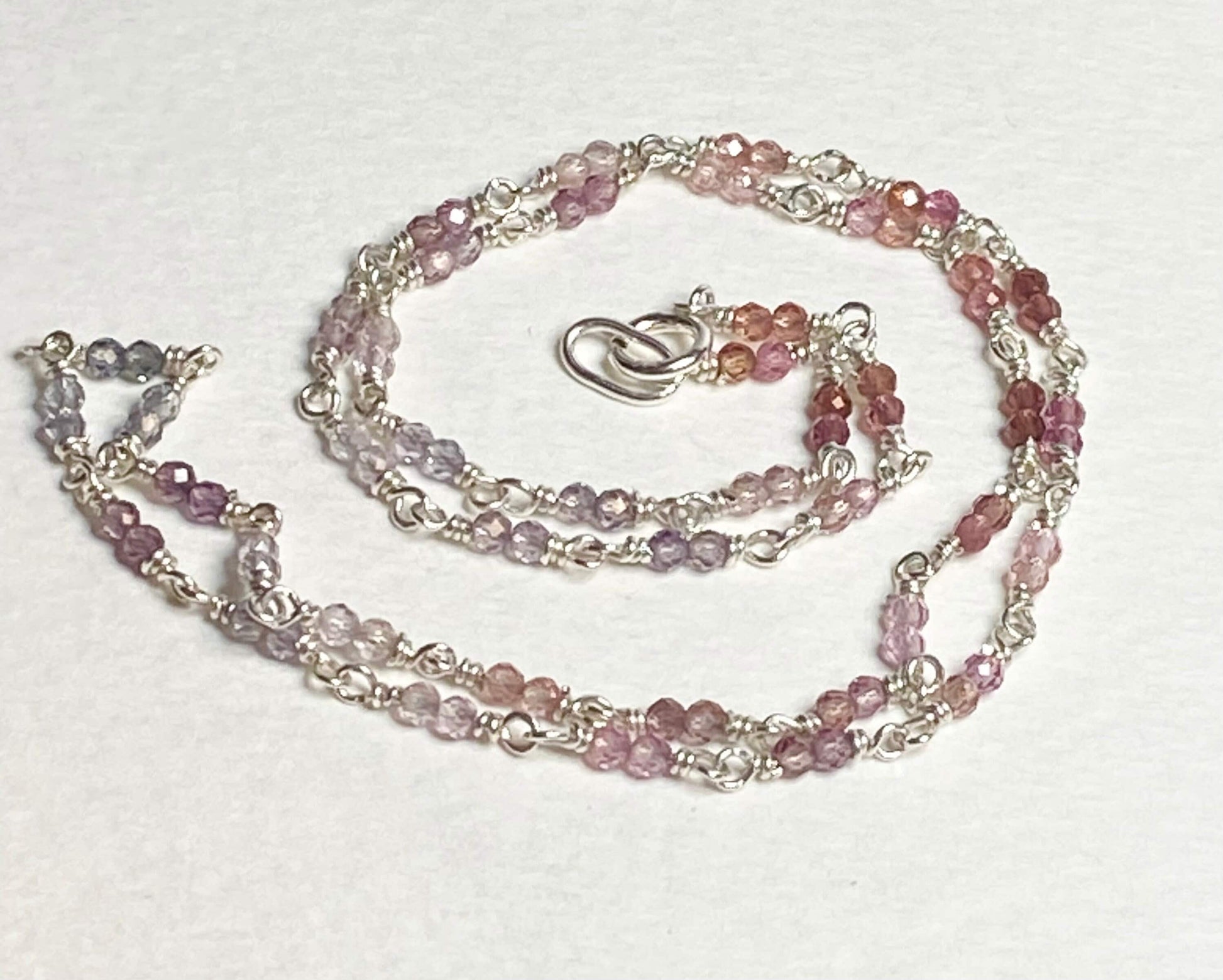 Natural multi-colored spinel beaded necklace in solid sterling silver.