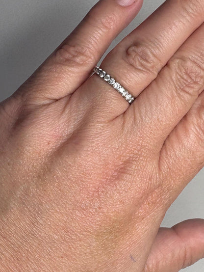 14k white gold full eternity band with 1ctw natural diamonds.
