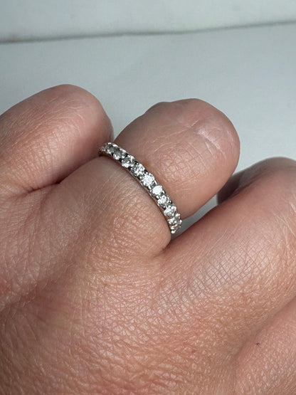 14k white gold eternity band with 1ctw natural diamonds.