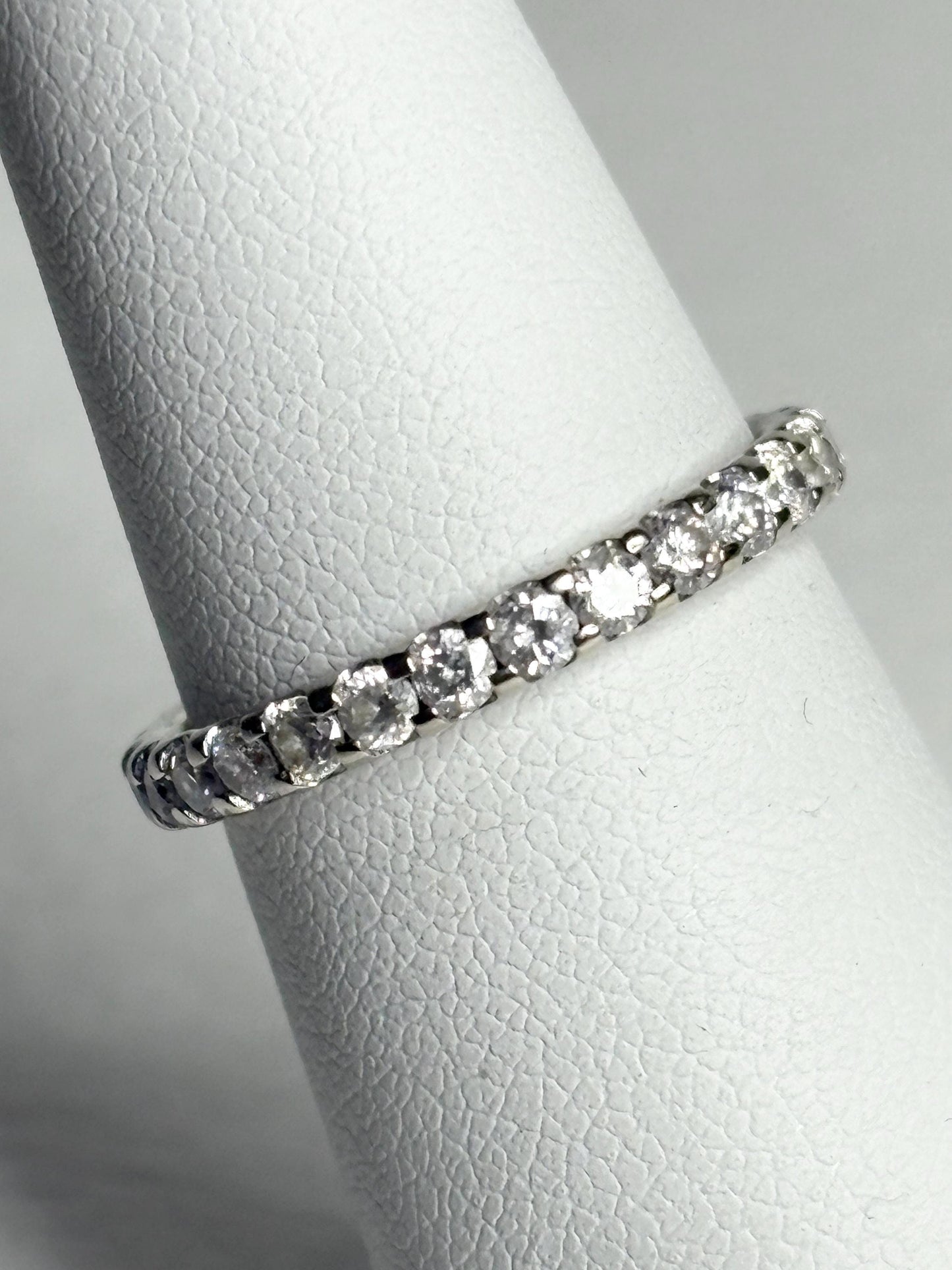 14k white gold eternity band with 1ctw diamonds.