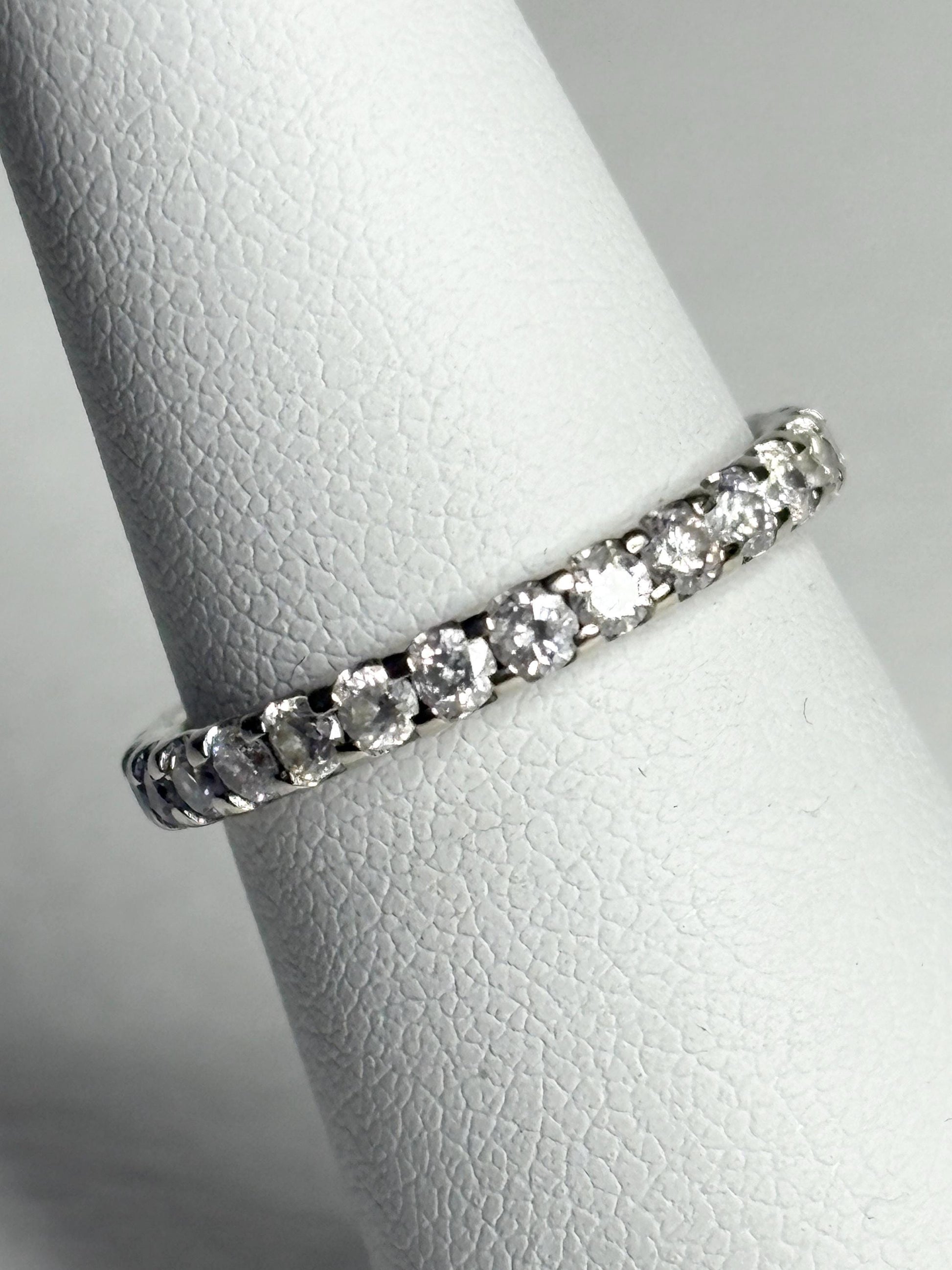 14k white gold eternity band with 1ctw diamonds.