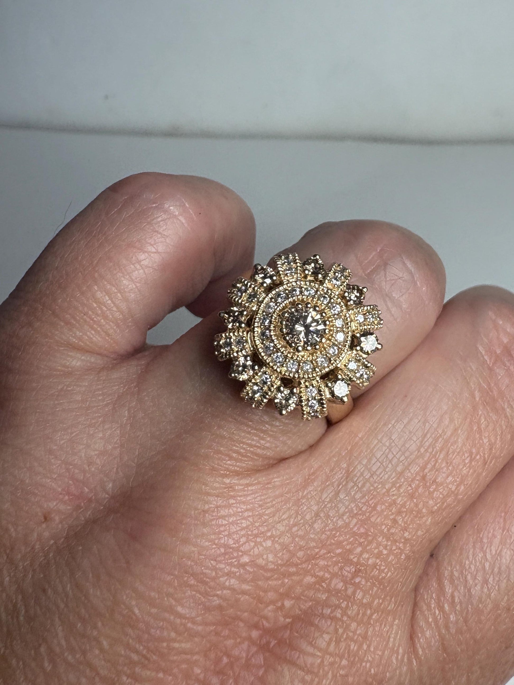 Bold 14k gold sunburst ring with champagne diamonds.