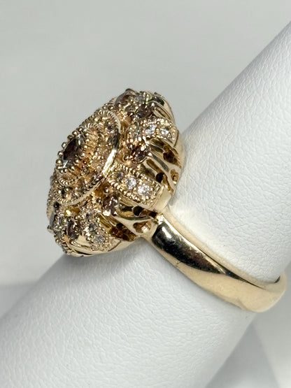 Bold 14k gold ring with champagne diamonds in a sunburst design.