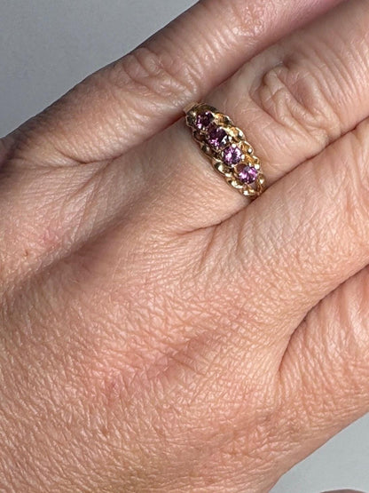 Rhodolite garnet rope band ring in solid 10k gold.