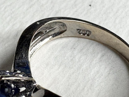 Ring with "750" hallmark, likely 18k gold.