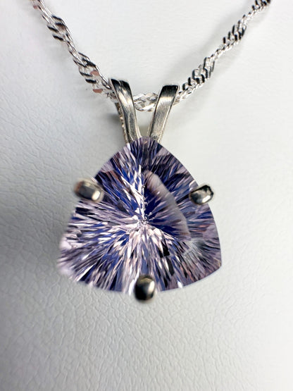 Sterling silver pendant necklace with a trillion-cut kunzite gemstone.