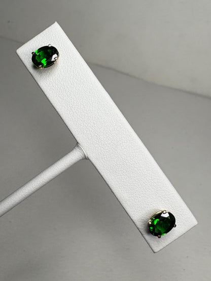 Oval chrome diopside stud earrings in 14k gold.