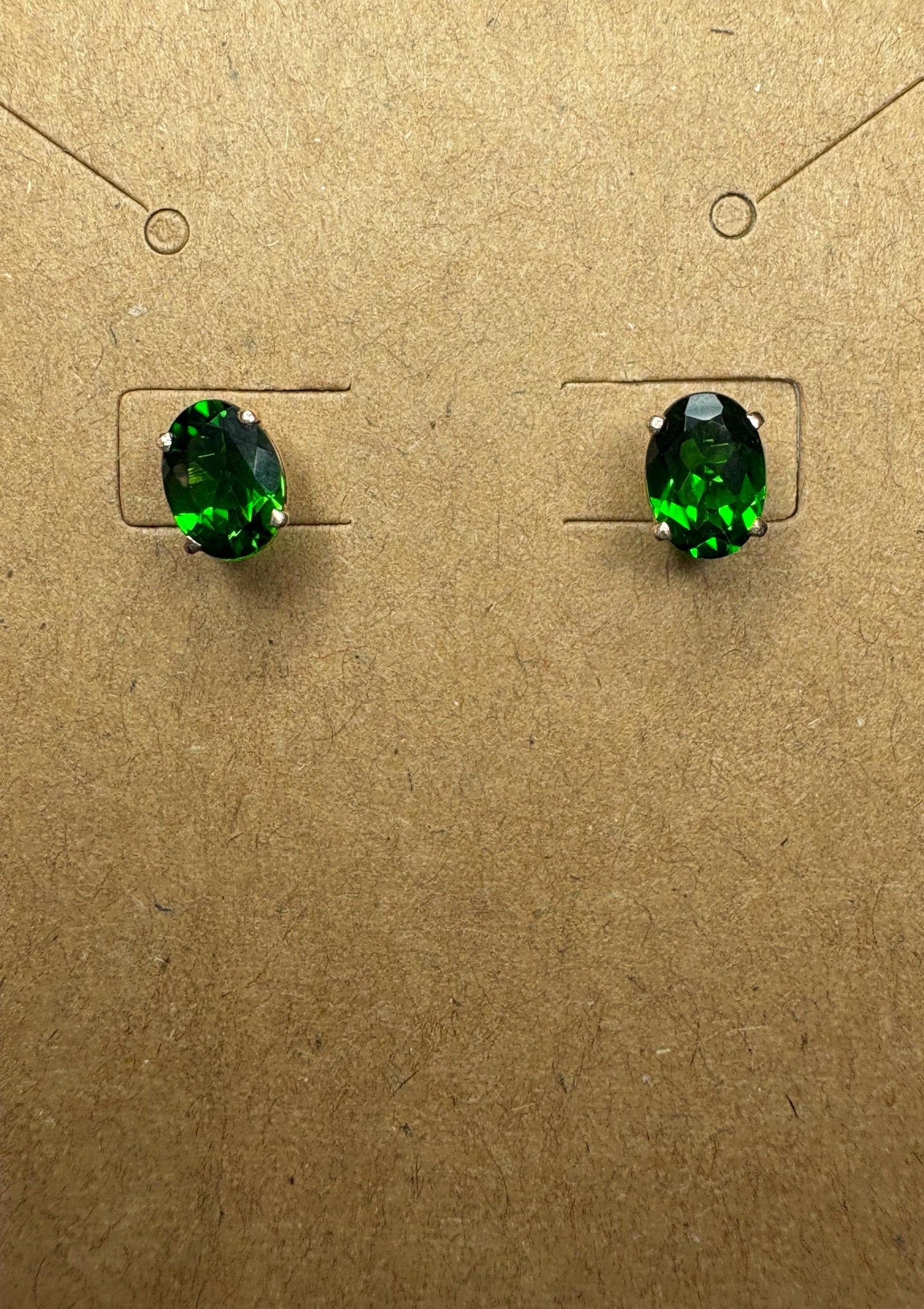 14k gold stud earrings with oval chrome diopside stones.