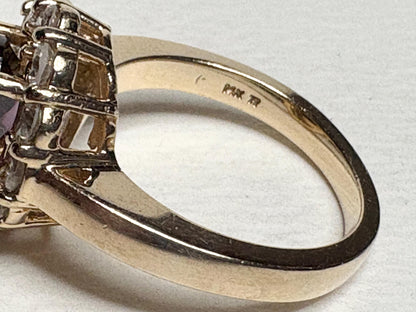 14k yellow gold ring with checkerboard faceted rhodolite garnet and diamonds.