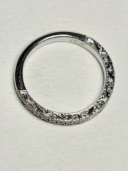 14k white gold stackable band ring with intricate detailing and diamonds.