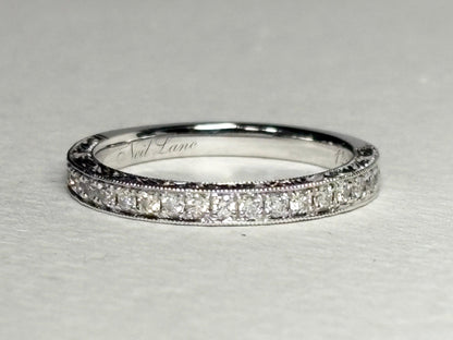 Neil Lane 14k white gold band with diamonds and intricate detailing.