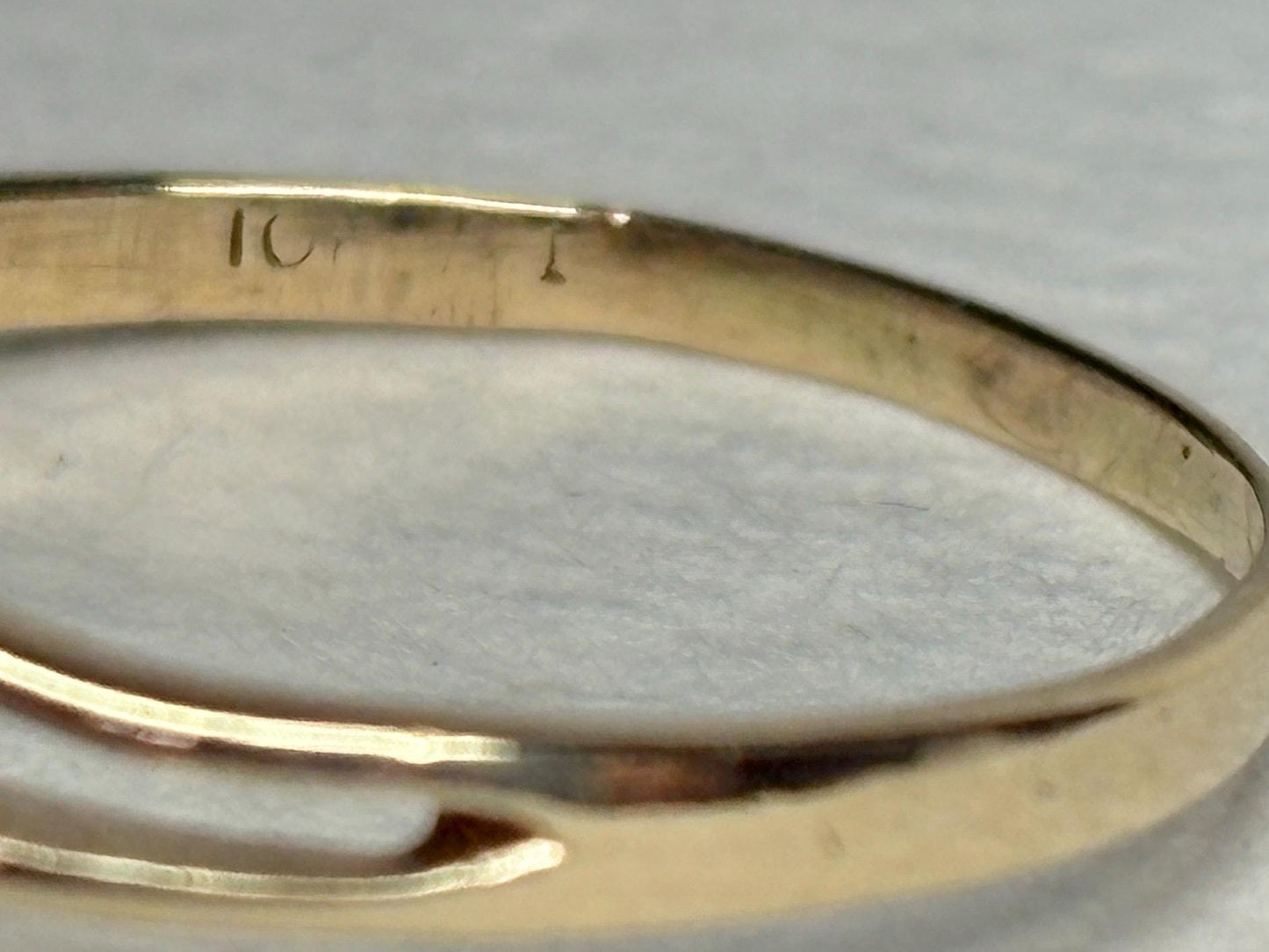 Solid 10k gold ring with "10k" stamp.