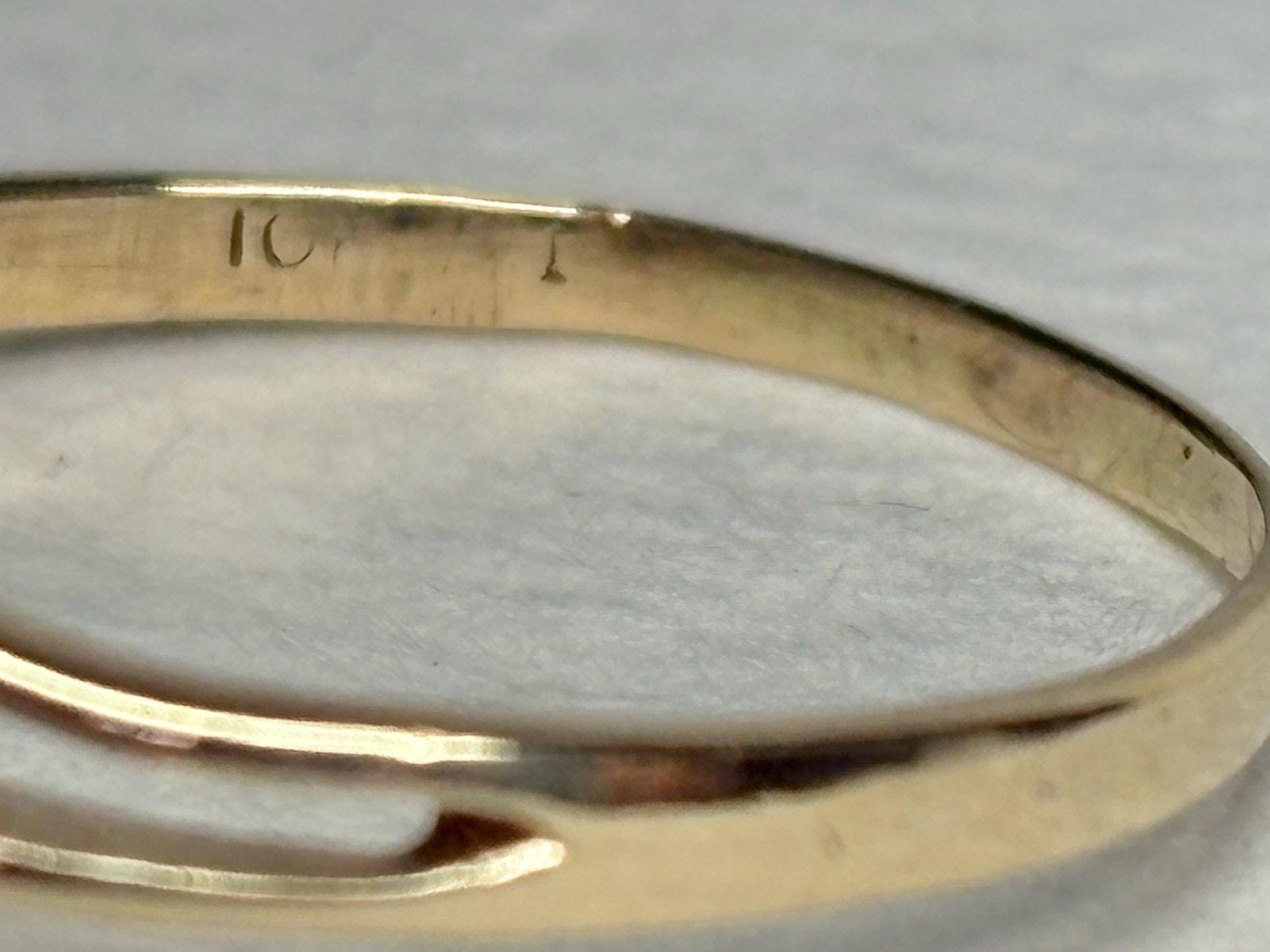 Solid 10k gold ring with "10k" stamp.